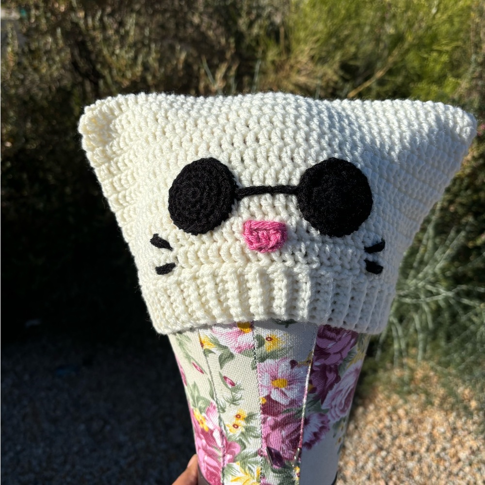 Cream Cat Beanie with black glasses, pink mouth and whisker details